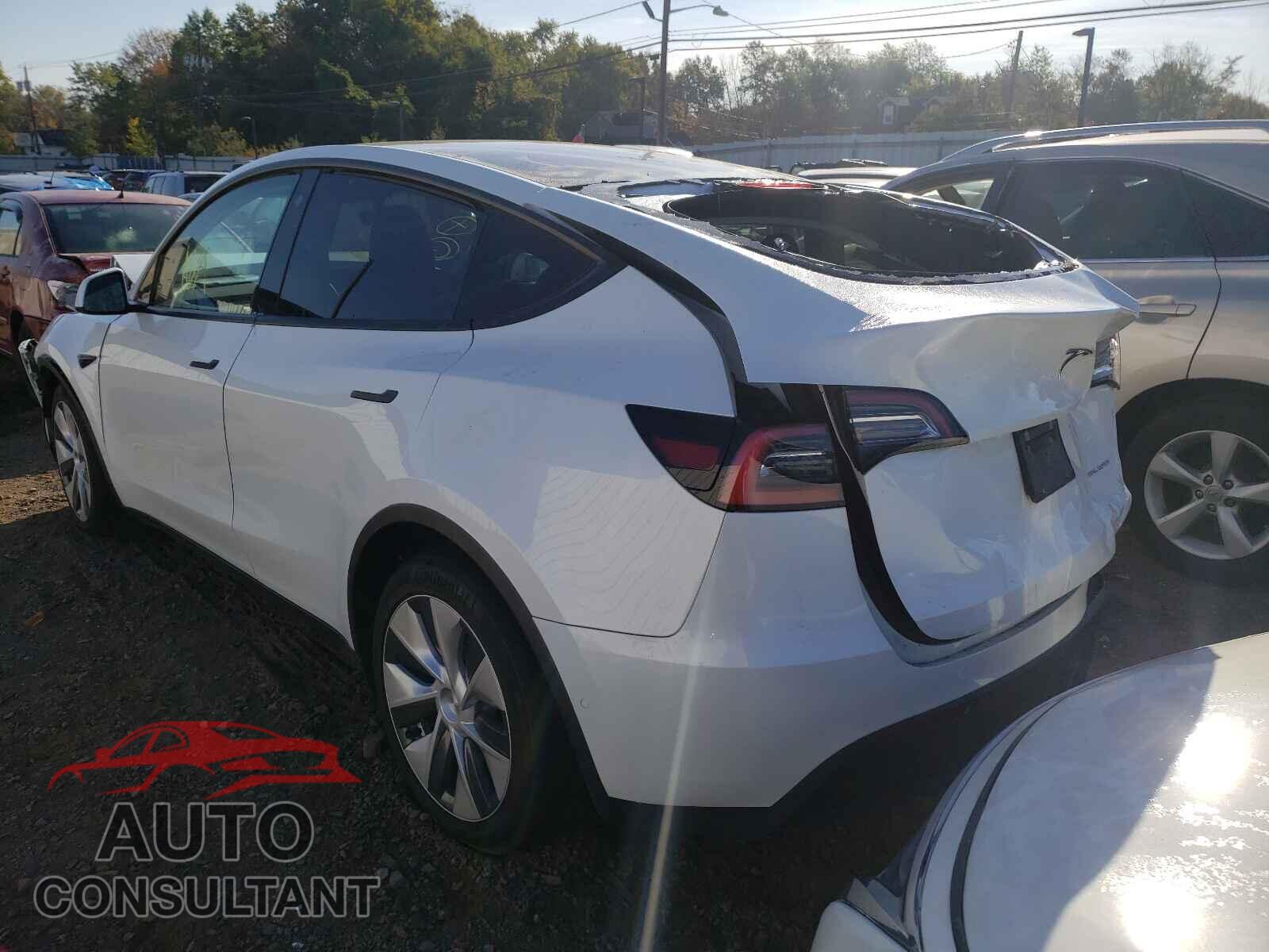 TESLA MODEL Y 2021 - 5YJYGDEE6MF063086