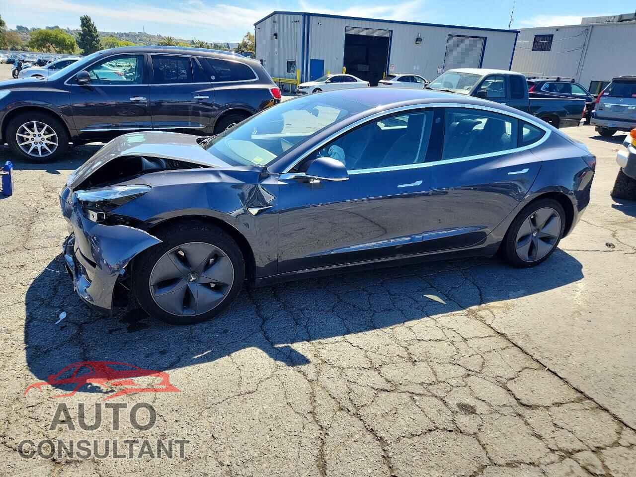 TESLA MODEL 3 2018 - 5YJ3E1EA0JF010309