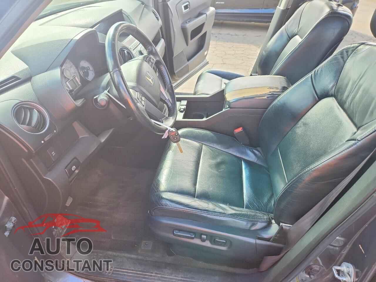 HONDA PILOT 2011 - 5FNYF4H50BB076587