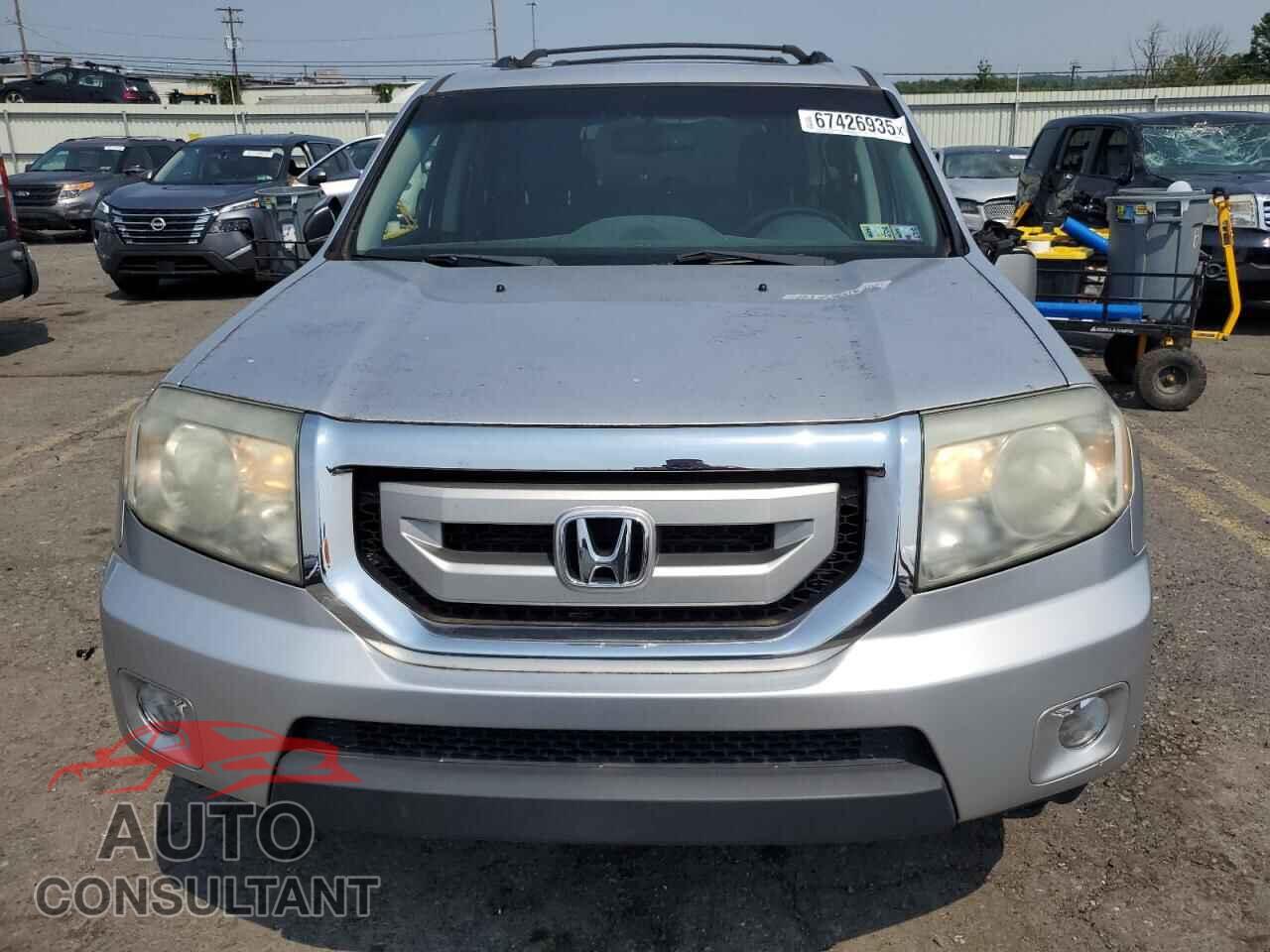 HONDA PILOT 2011 - 5FNYF4H74BB038121