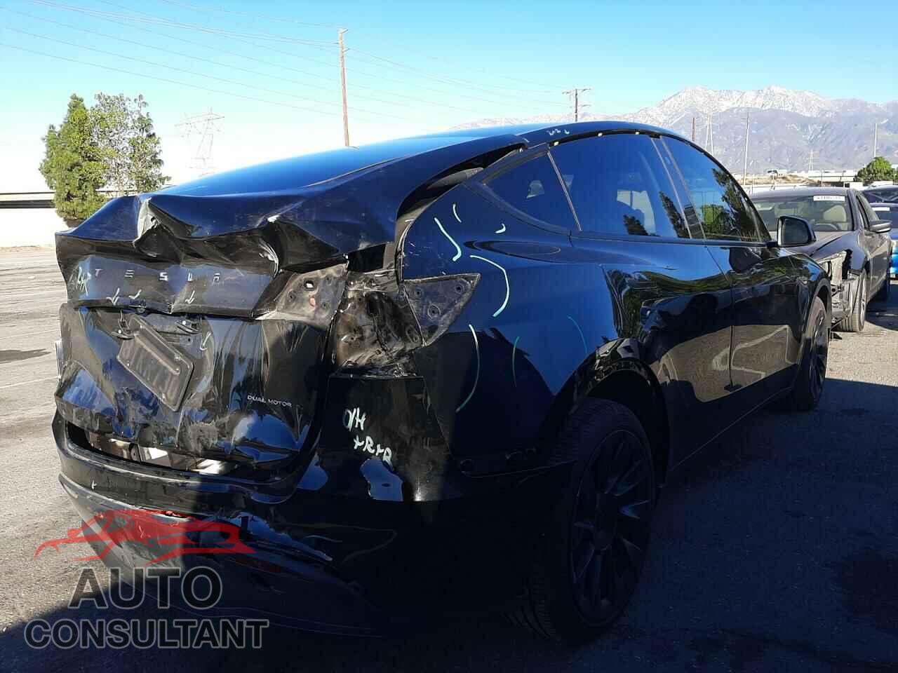 TESLA MODEL Y 2021 - 5YJYGDEEXMF073717