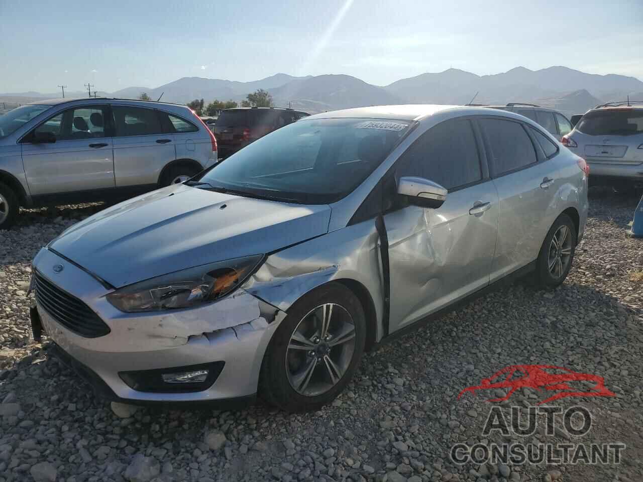 FORD FOCUS 2016 - 1FADP3FE9GL374851