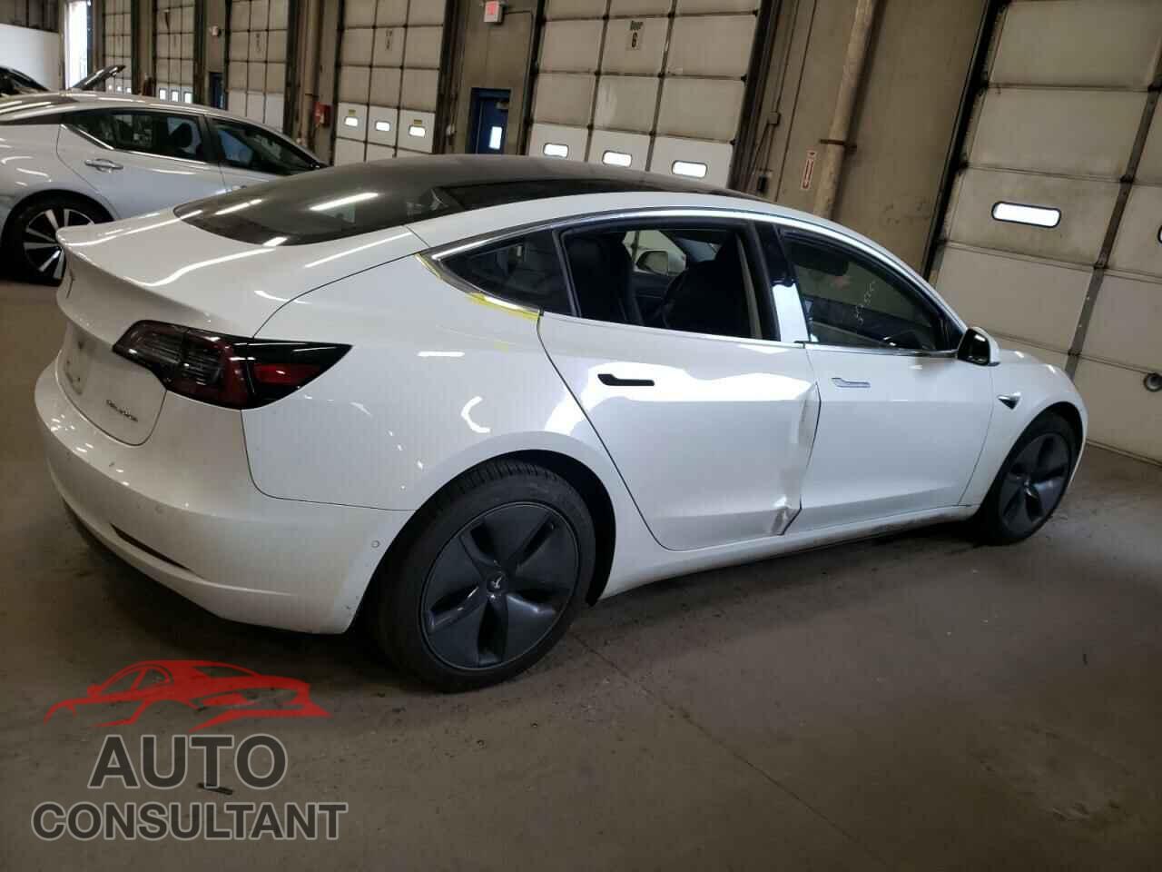 TESLA MODEL 3 2018 - 5YJ3E1EB2JF115457
