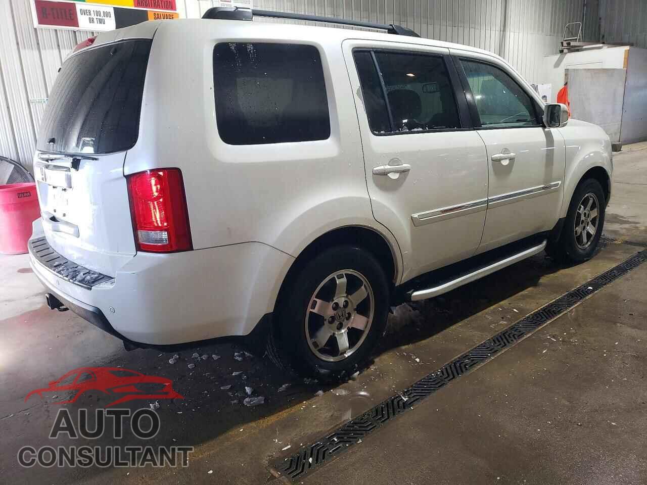 HONDA PILOT 2011 - 5FNYF4H90BB104150