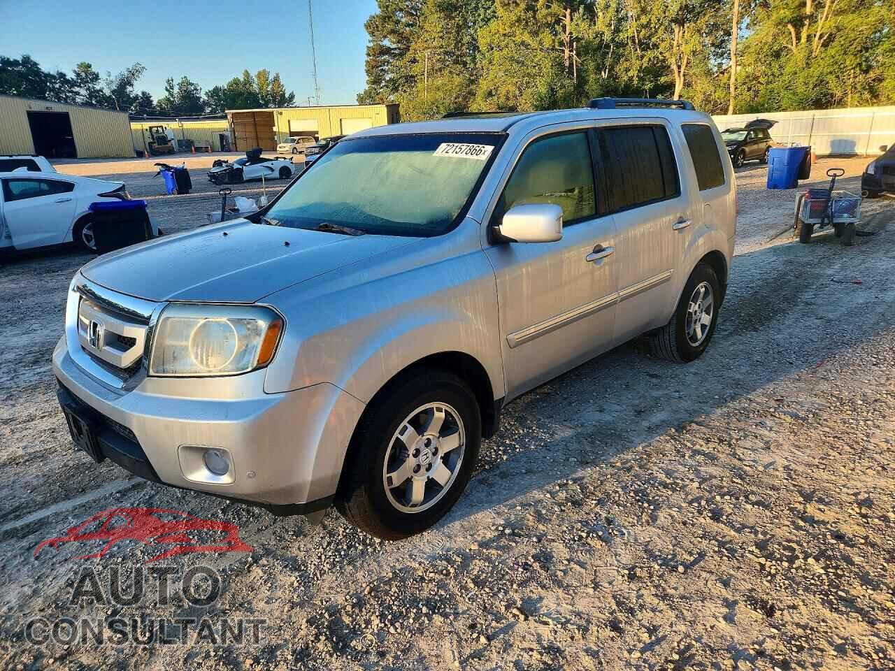 HONDA PILOT 2011 - 5FNYF4H94BB018680