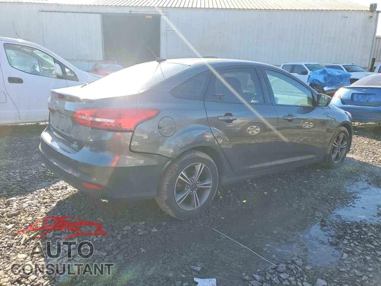 FORD FOCUS 2018 - 1FADP3FE0JL215093