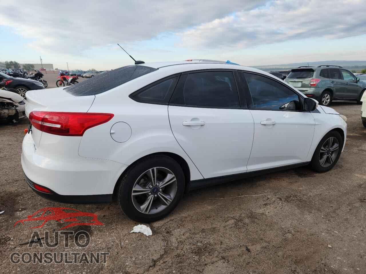 FORD FOCUS 2017 - 1FADP3FE3HL329213