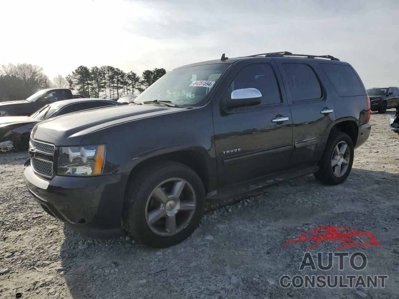 CHEVROLET TAHOE 2011 - 1GNSCAE04BR354382