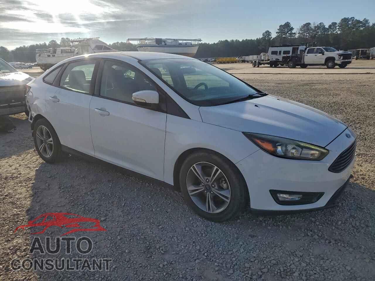 FORD FOCUS 2017 - 1FADP3FE0HL281752