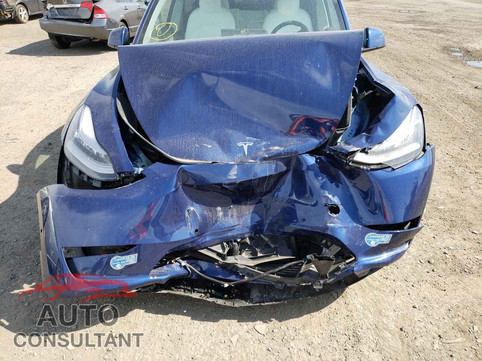TESLA MODEL Y 2021 - 5YJYGDED6MF109085
