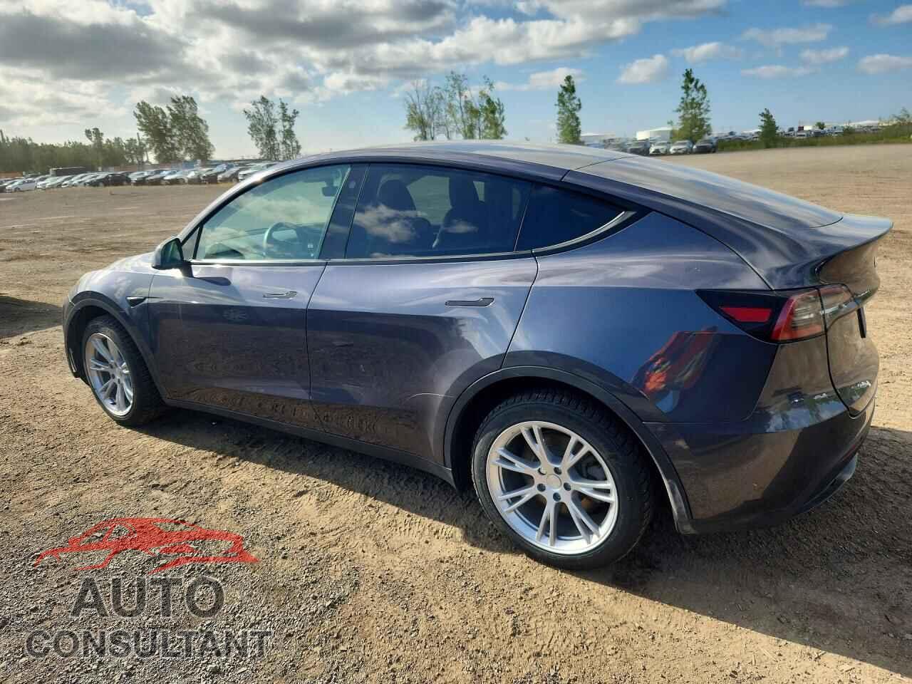 TESLA MODEL Y 2023 - LRWYGDFD6PC221138