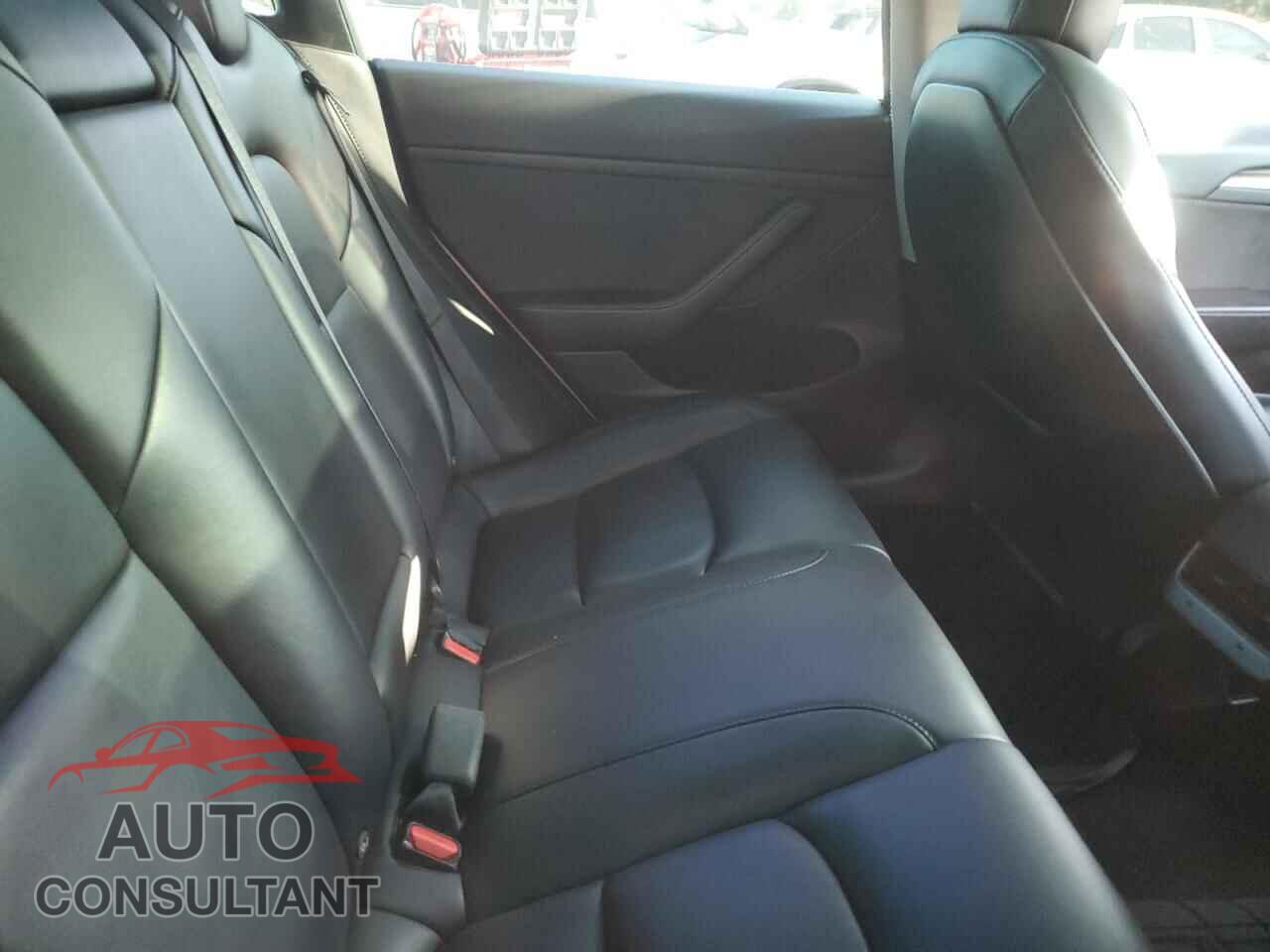TESLA MODEL 3 2022 - 5YJ3E1EA7NF144143