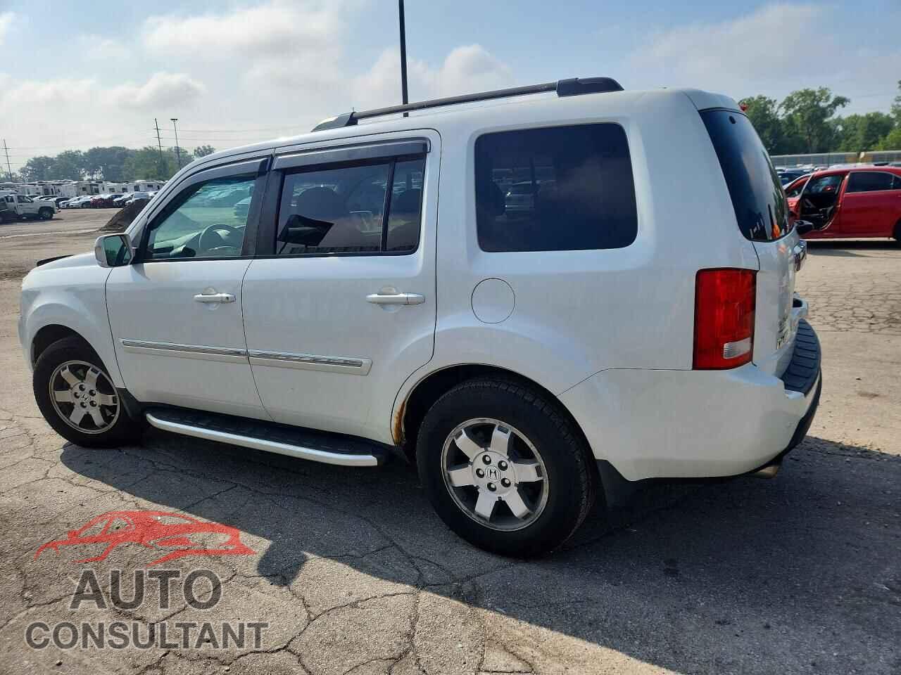 HONDA PILOT 2011 - 5FNYF4H94BB040193