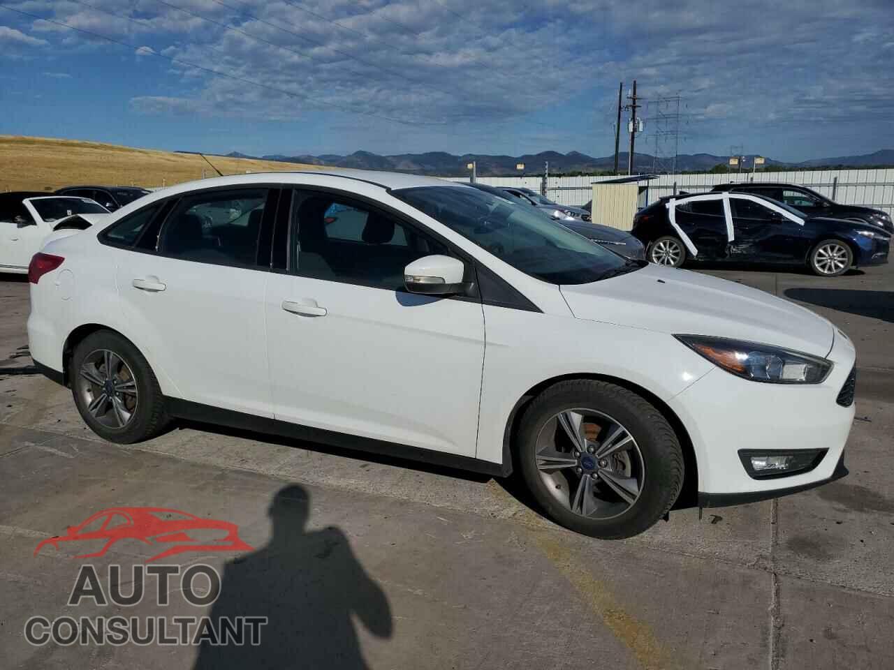 FORD FOCUS 2017 - 1FADP3FE9HL295813
