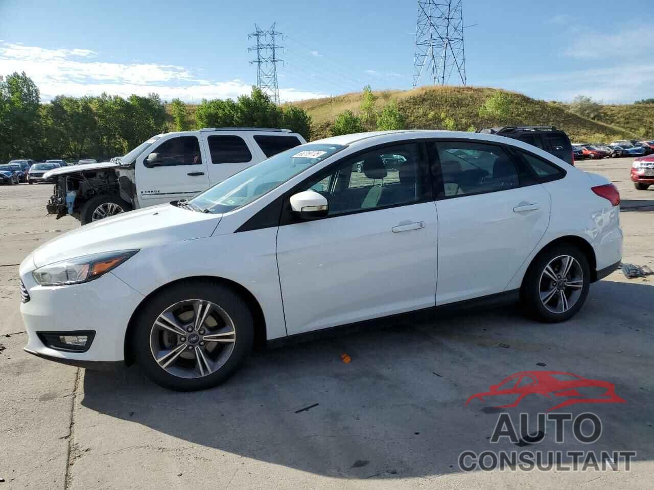 FORD FOCUS 2017 - 1FADP3FE9HL295813