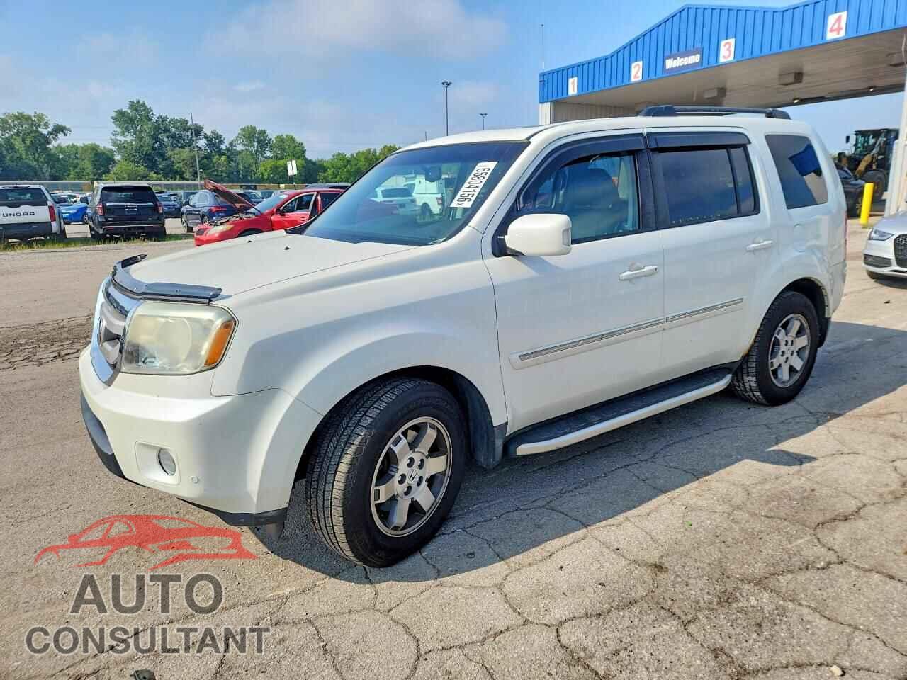 HONDA PILOT 2011 - 5FNYF4H94BB040193