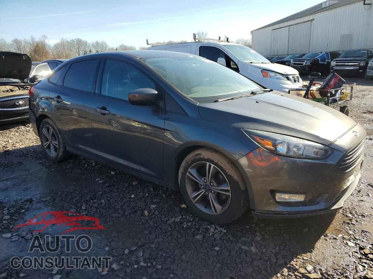 FORD FOCUS 2018 - 1FADP3FE0JL215093