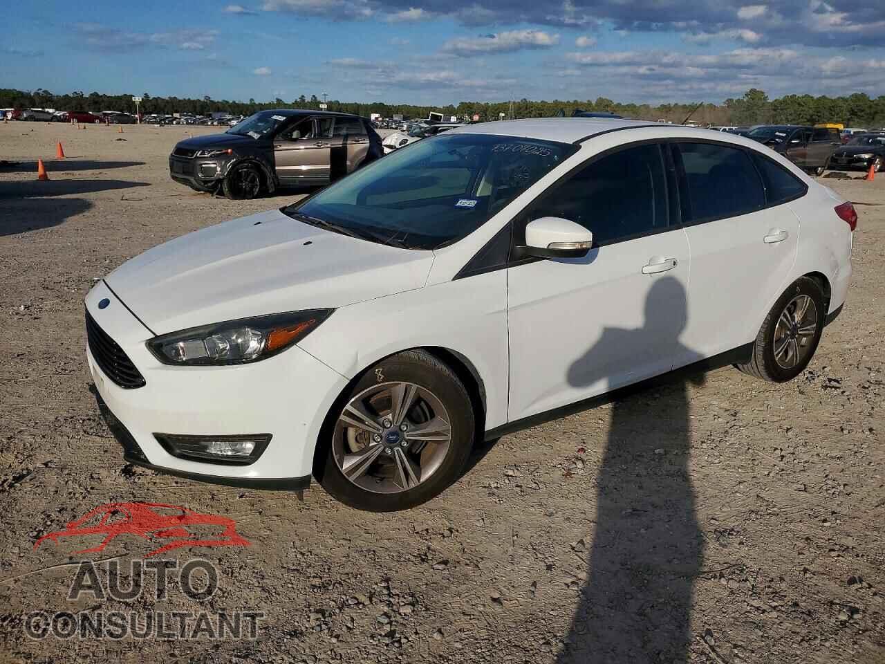 FORD FOCUS 2017 - 1FADP3FE7HL276502