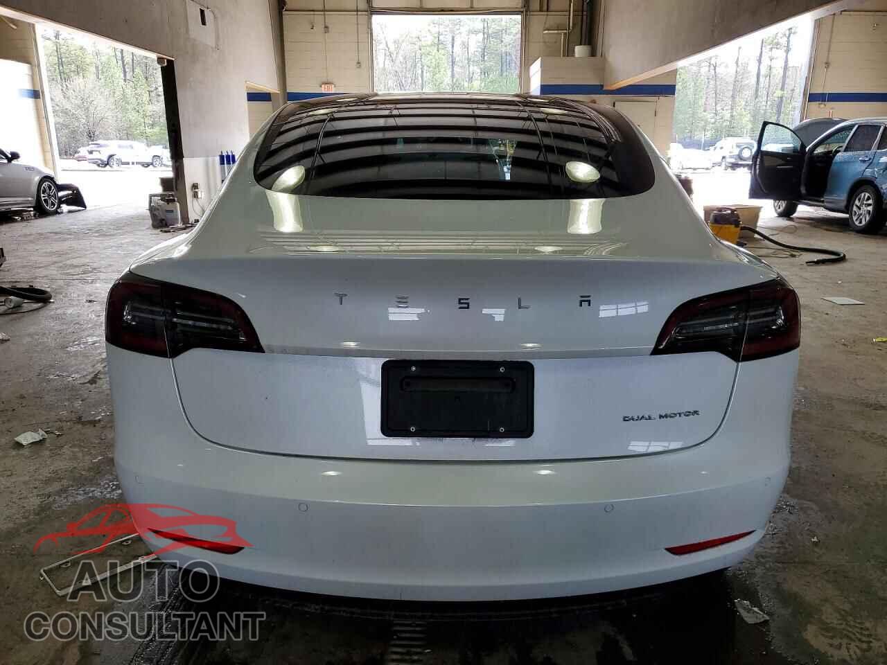 TESLA MODEL 3 2022 - 5YJ3E1EB3NF243938
