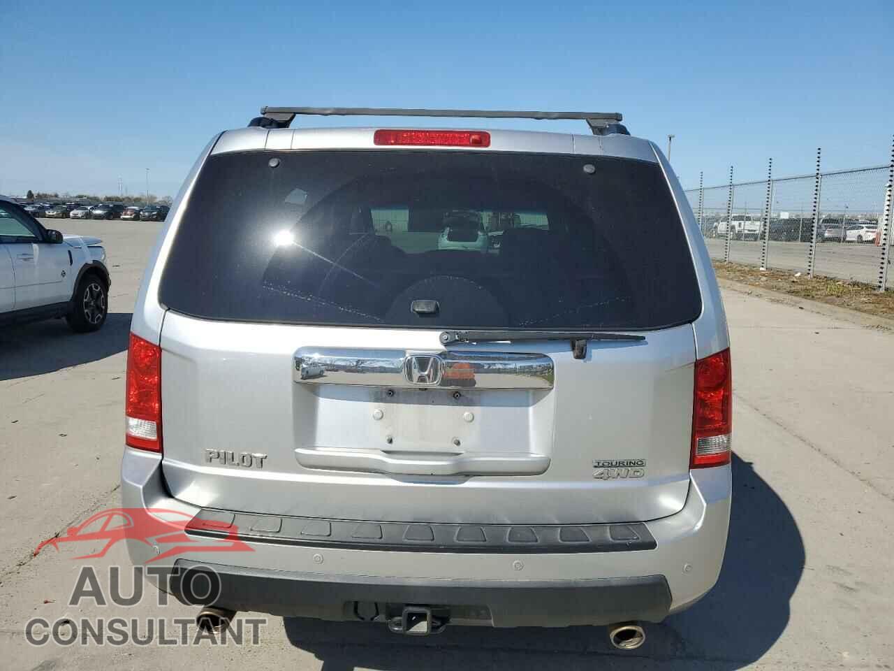 HONDA PILOT 2010 - 5FNYF4H97AB036539