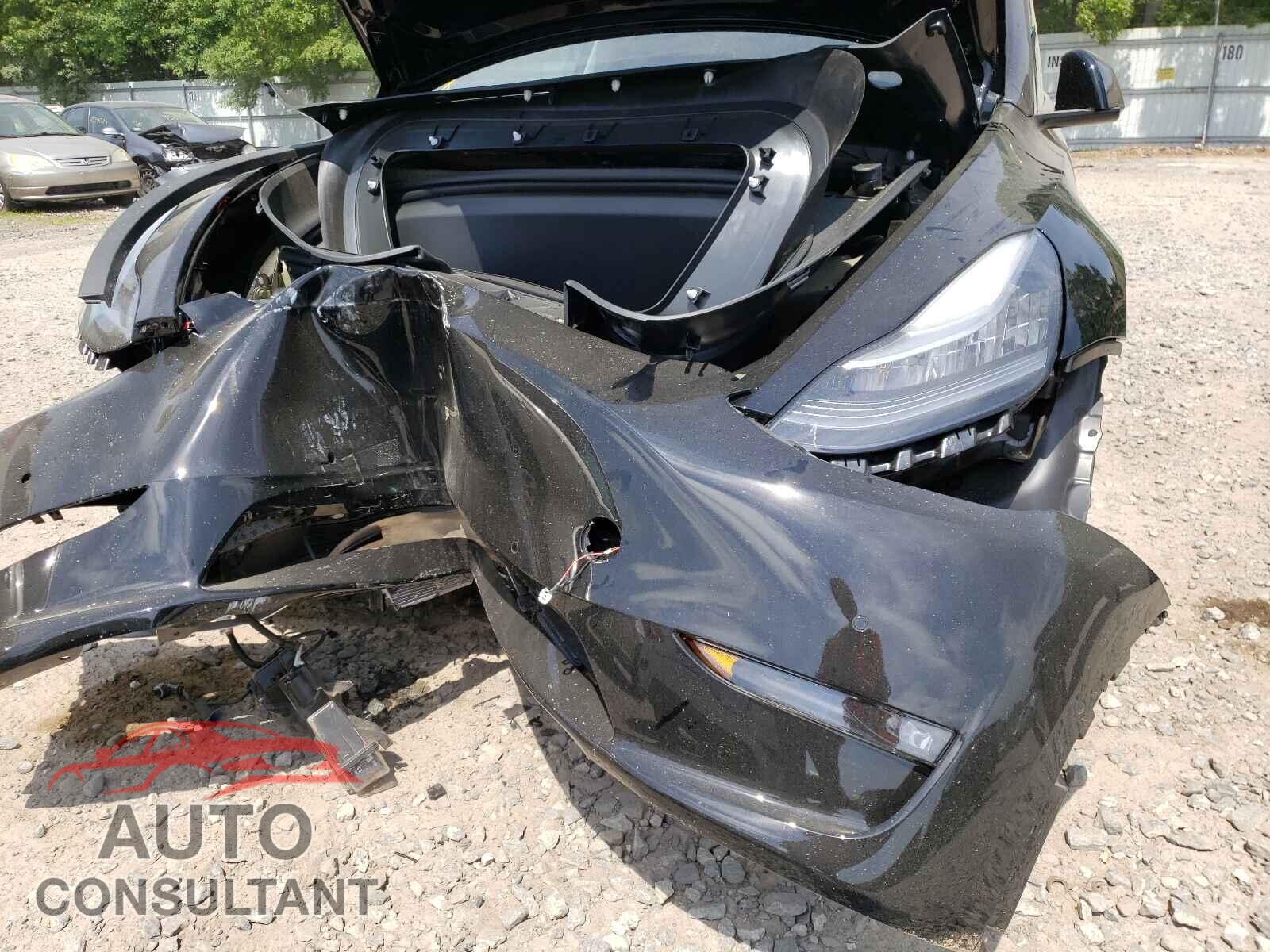 TESLA MODEL Y 2021 - 5YJYGAEE3MF143671