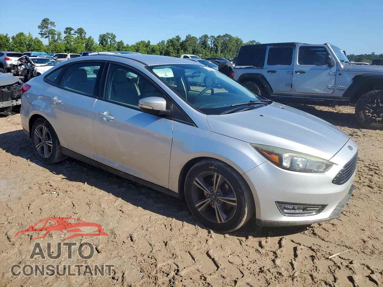 FORD FOCUS 2017 - 1FADP3FE0HL221051