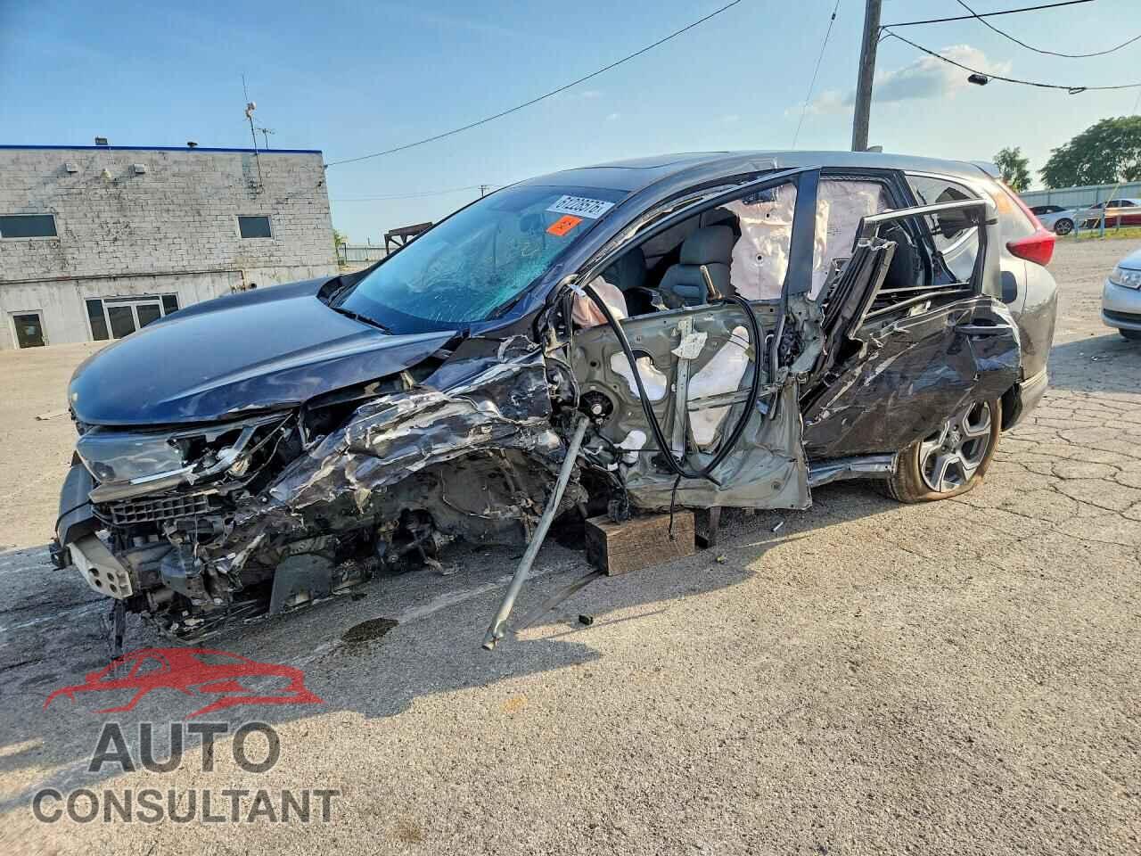 HONDA CRV 2017 - 5J6RW2H50HL036423