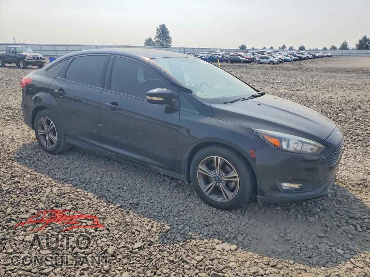 FORD FOCUS 2017 - 1FADP3FE9HL334951