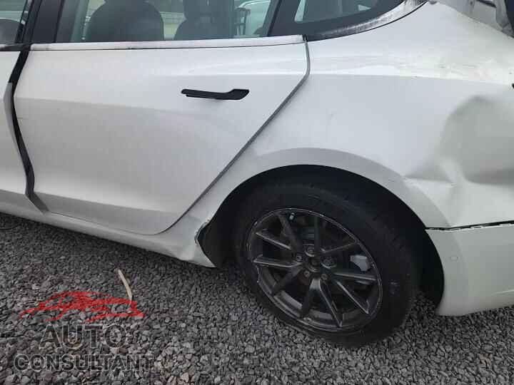 TESLA MODEL 3 2021 - 5YJ3E1EA9MF013620