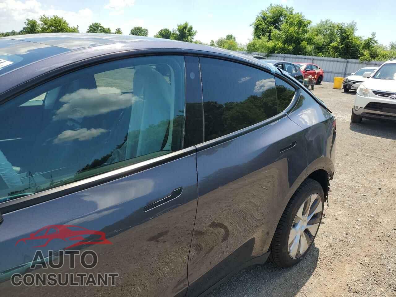 TESLA MODEL Y 2023 - LRWYGDFD1PC057653