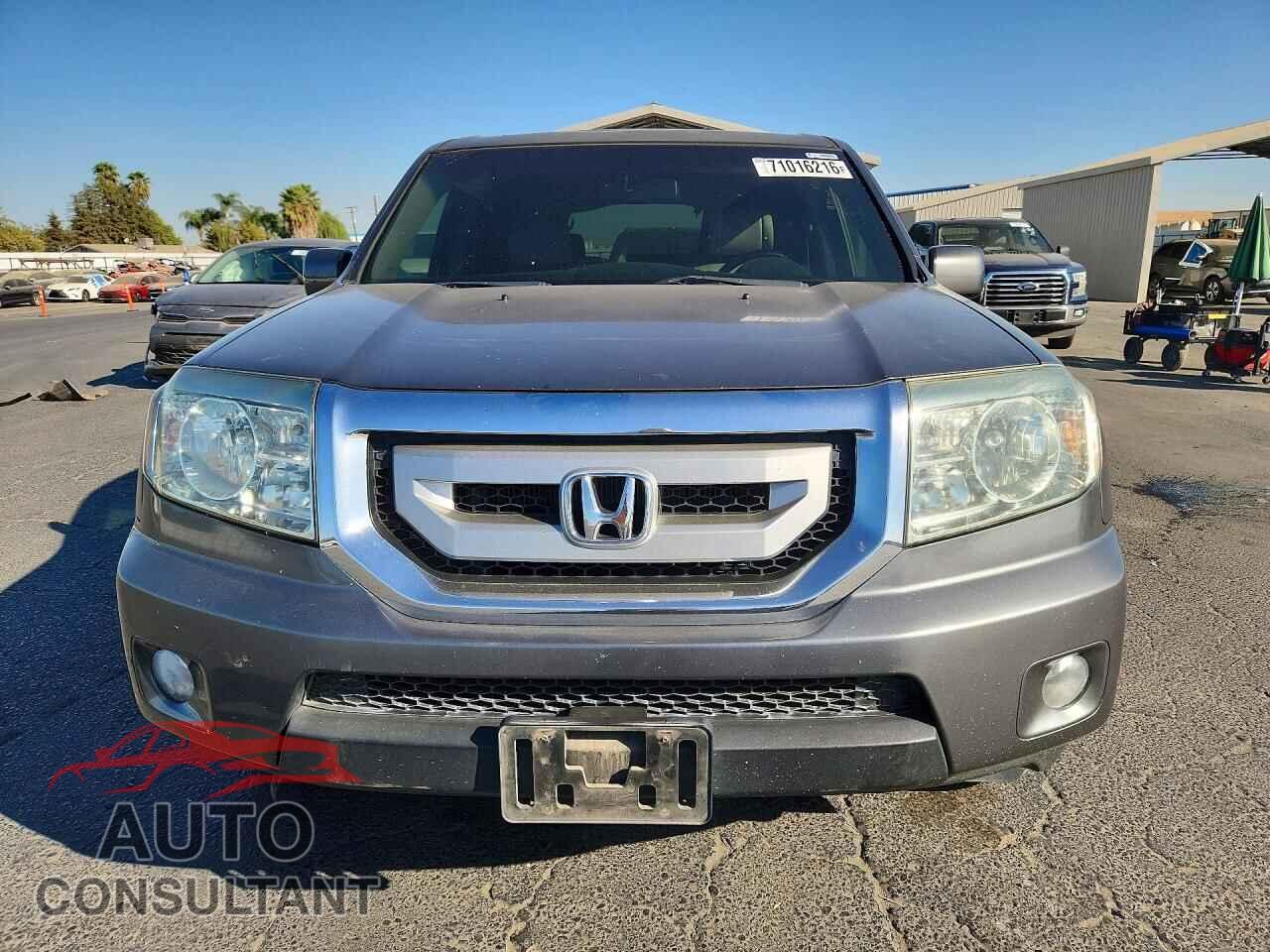 HONDA PILOT 2011 - 5FNYF4H64BB007264