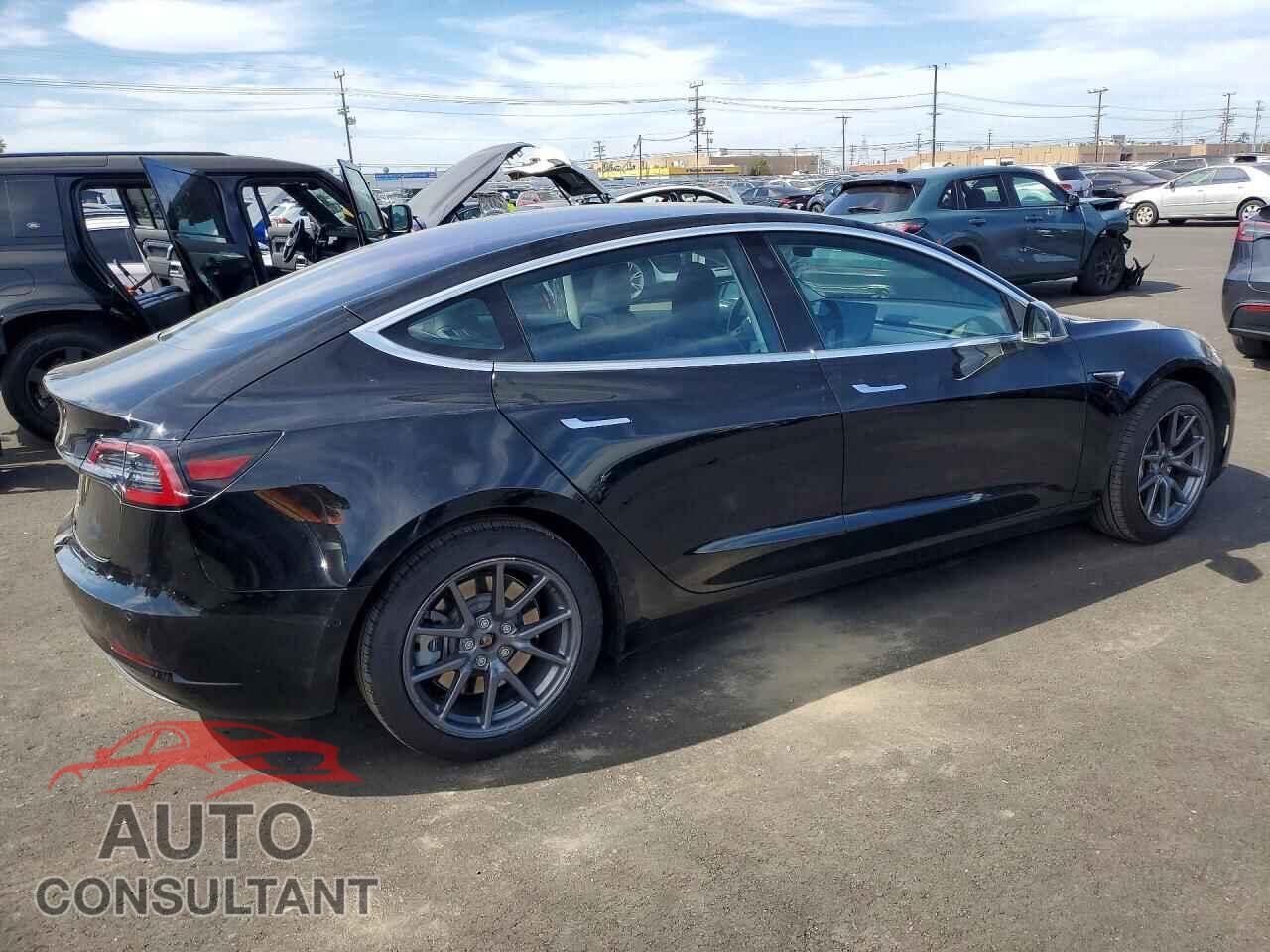 TESLA MODEL 3 2018 - 5YJ3E1EA9JF012477