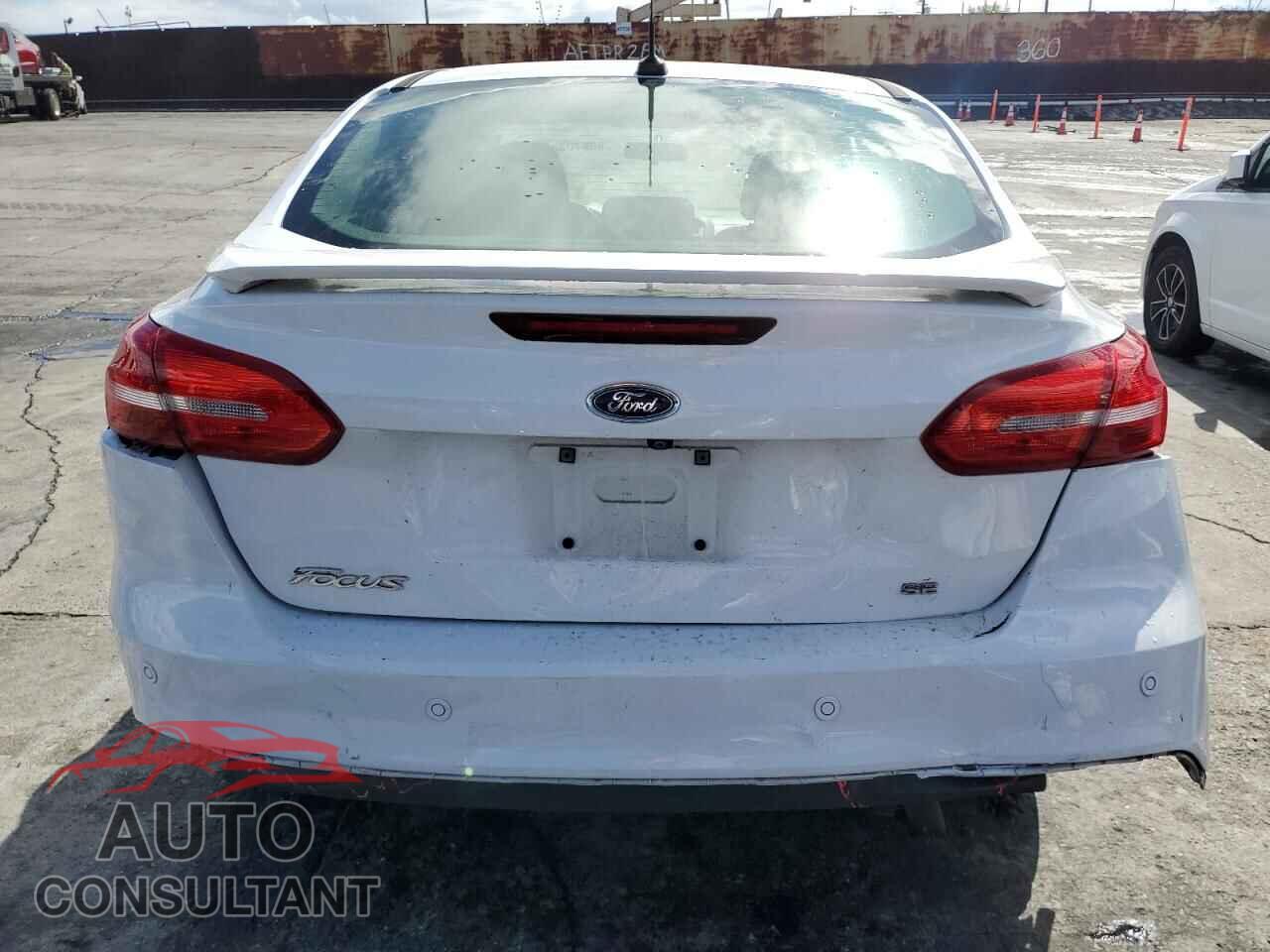 FORD FOCUS 2016 - 1FADP3F21GL227302