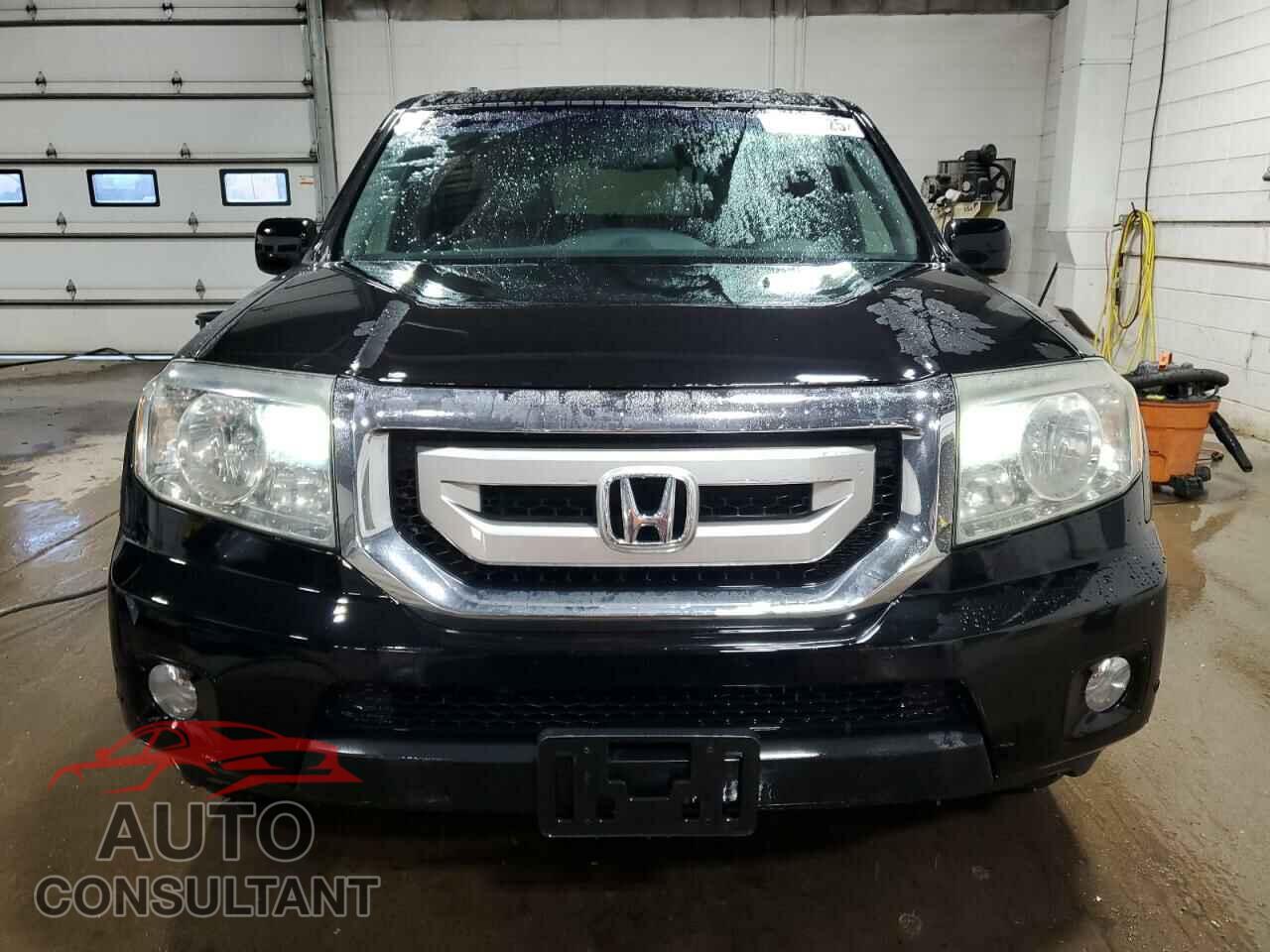 HONDA PILOT 2010 - 5FNYF4H99AB005583