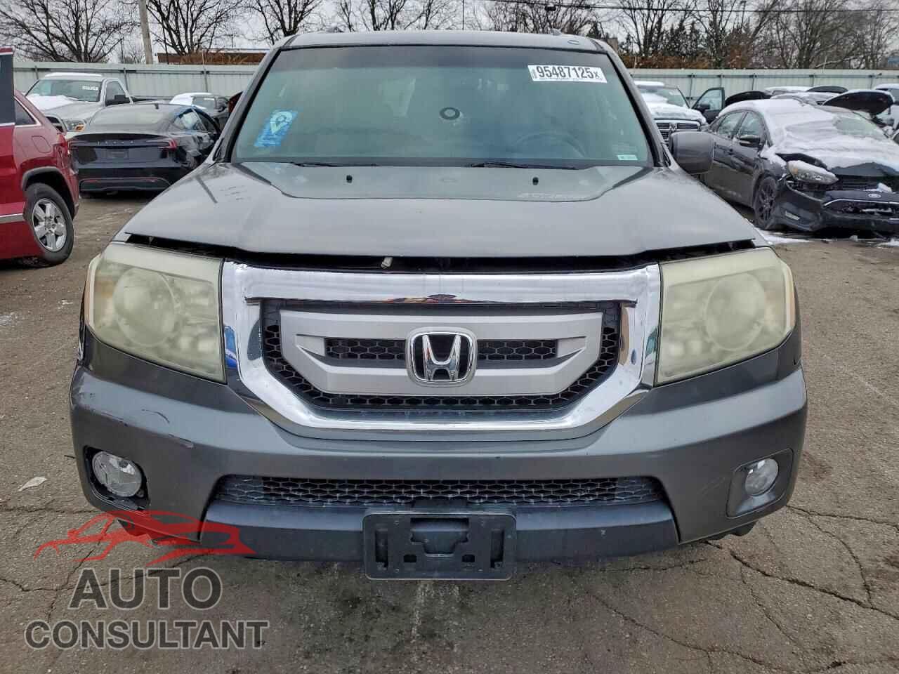 HONDA PILOT 2011 - 5FNYF4H71BB014925