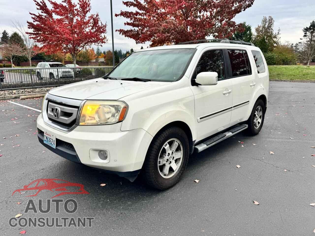 HONDA PILOT 2011 - 5FNYF4H96BB505010