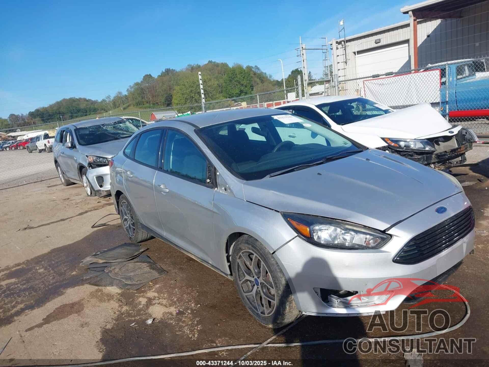 FORD FOCUS 2018 - 1FADP3FE0JL310141