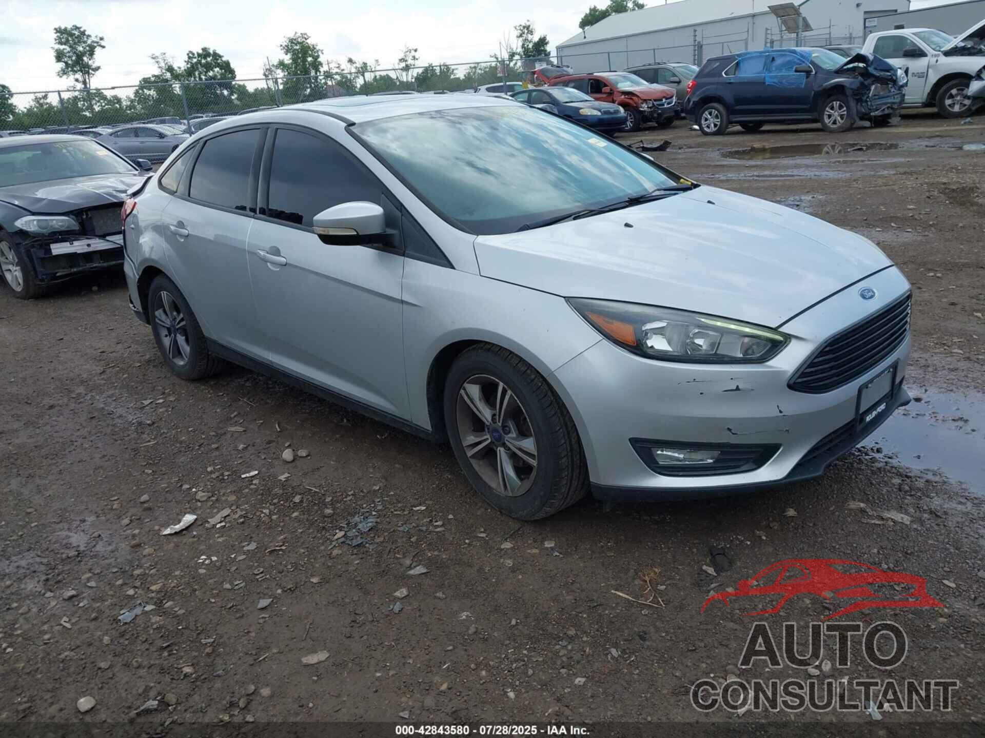 FORD FOCUS 2016 - 1FADP3FE9GL371819