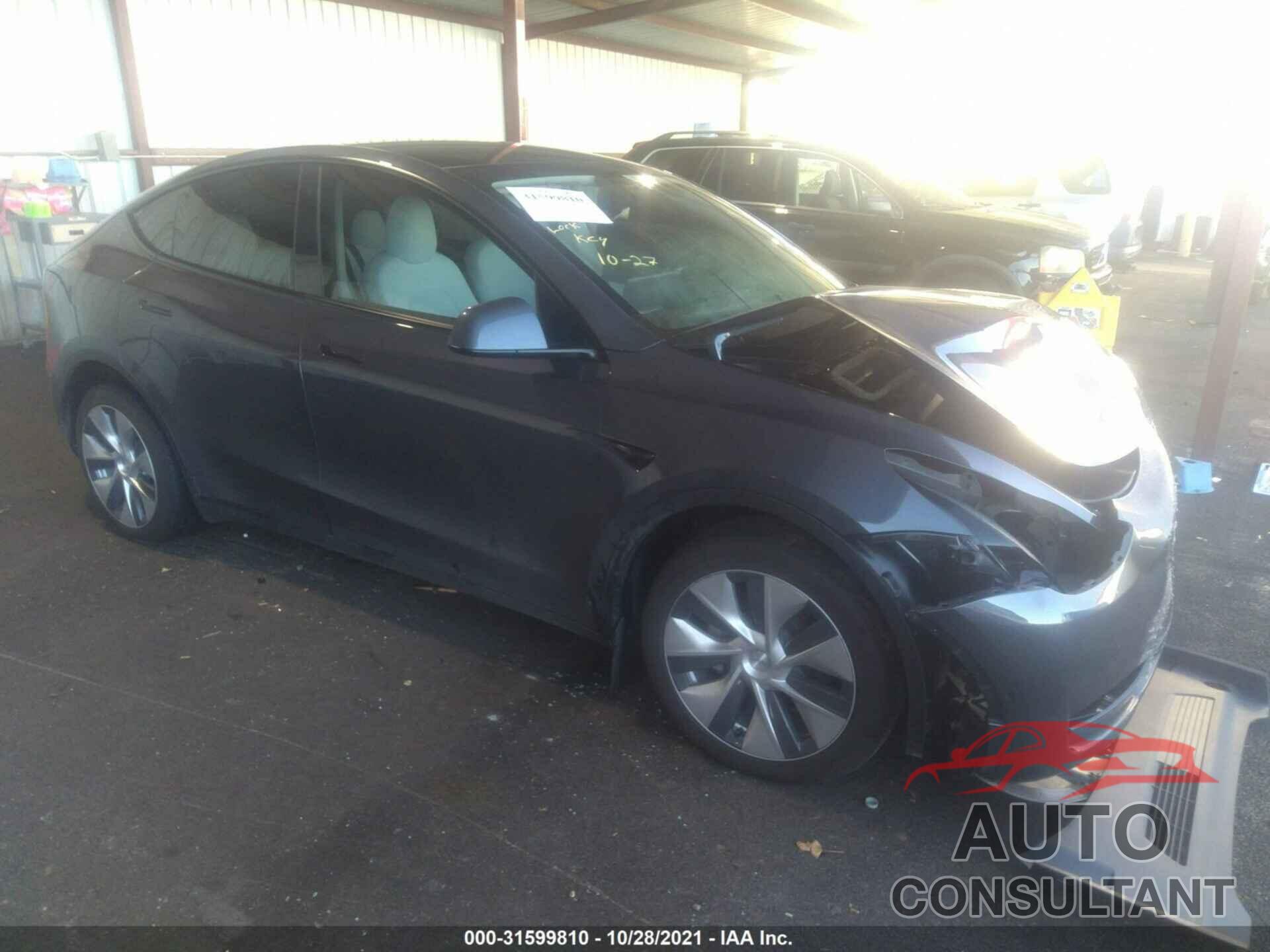 TESLA MODEL Y 2021 - 5YJYGDED6MF106087