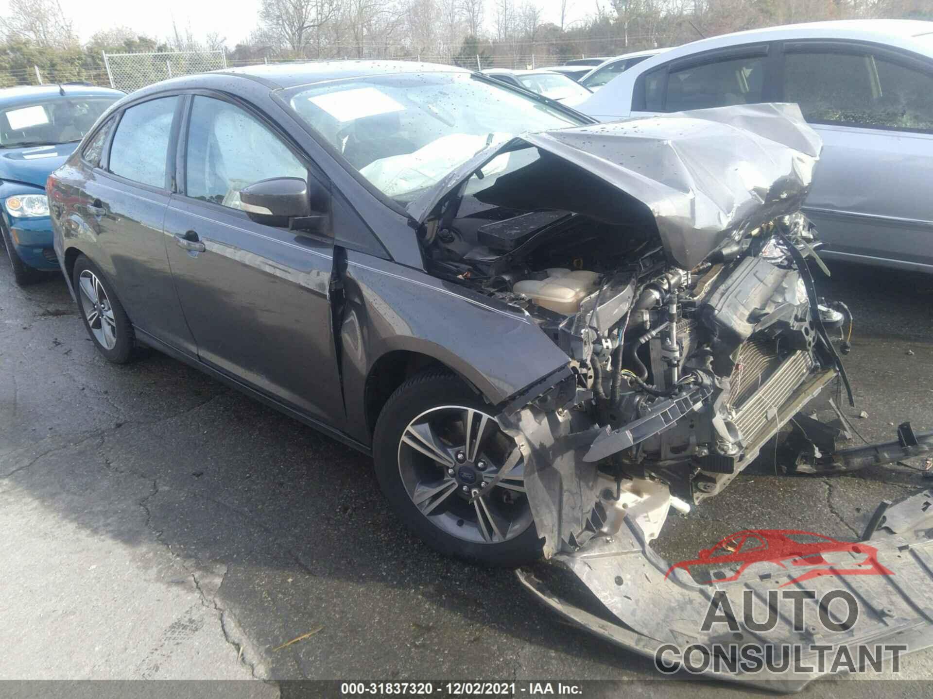 FORD FOCUS 2016 - 1FADP3FE3GL201083