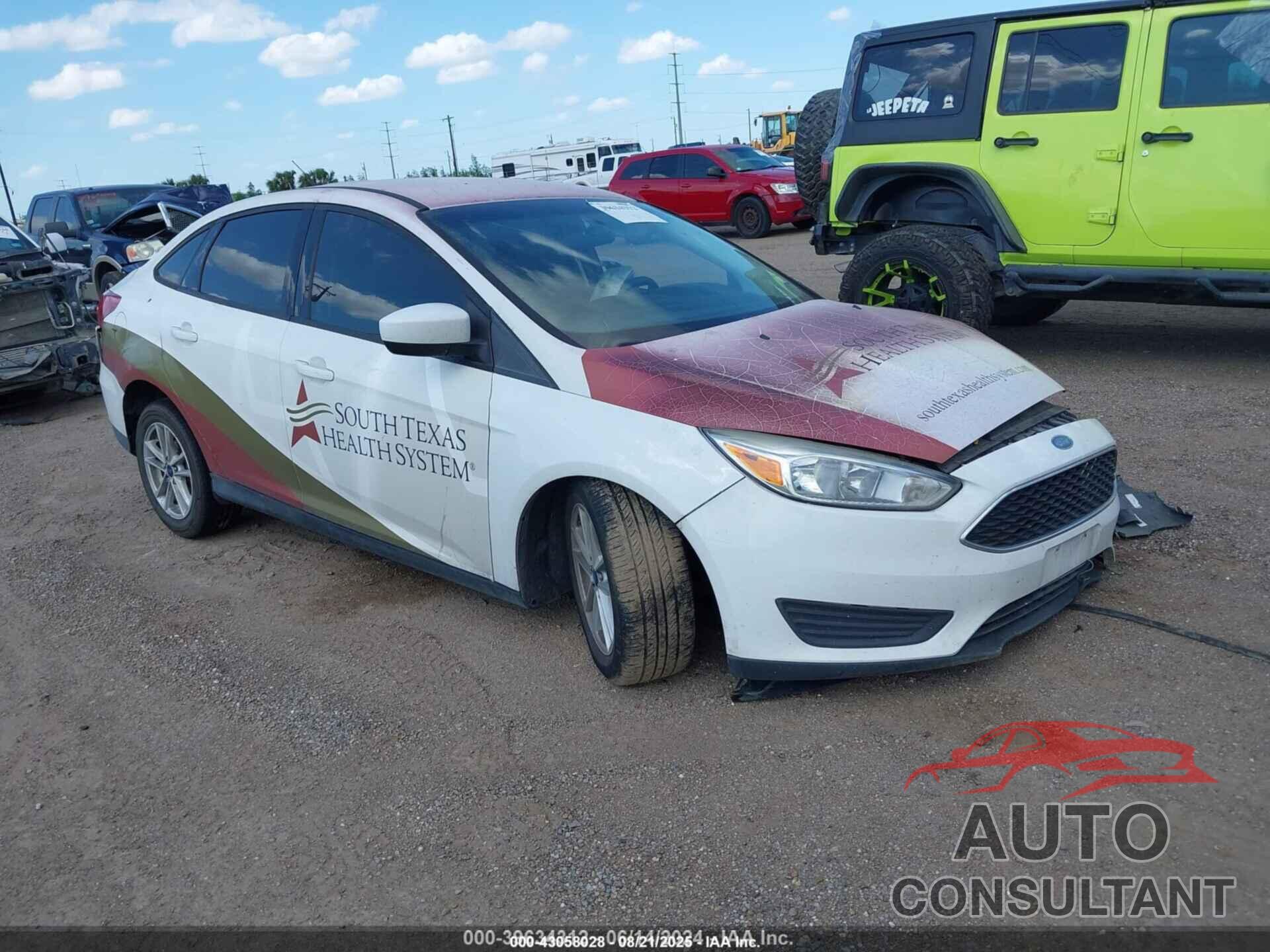 FORD FOCUS 2018 - 1FADP3F29JL210724