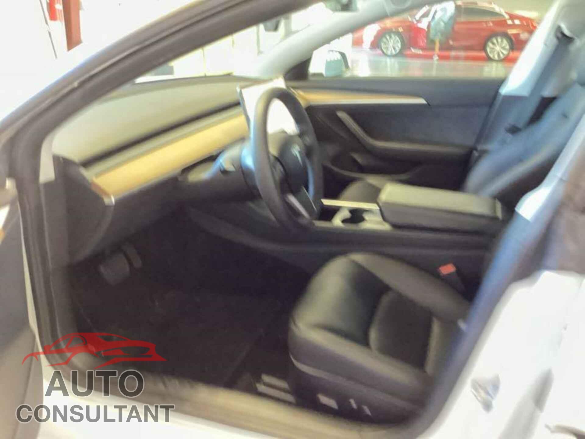 TESLA MODEL 3 2021 - 5YJ3E1EB1MF990436