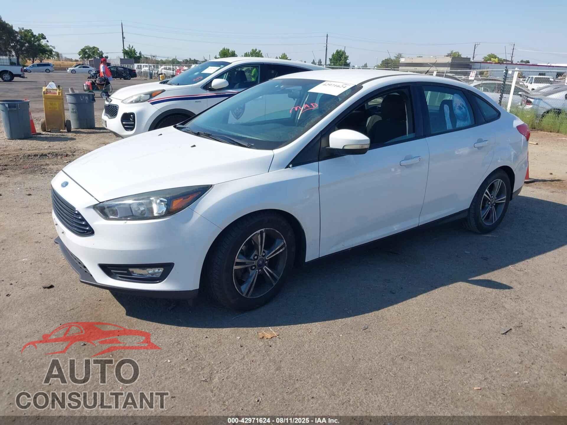 FORD FOCUS 2016 - 1FADP3FE0GL293270
