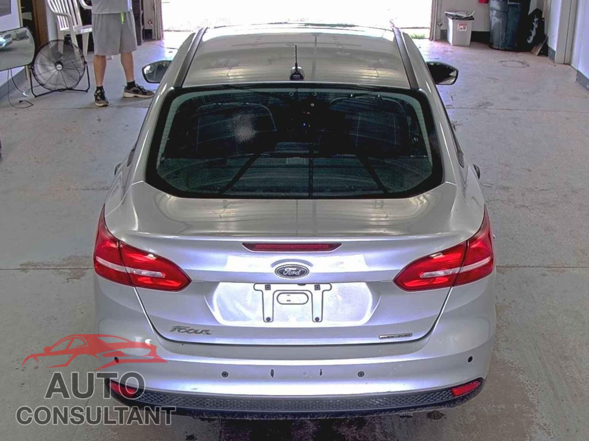 FORD FOCUS 2016 - 1FADP3E23GL311218