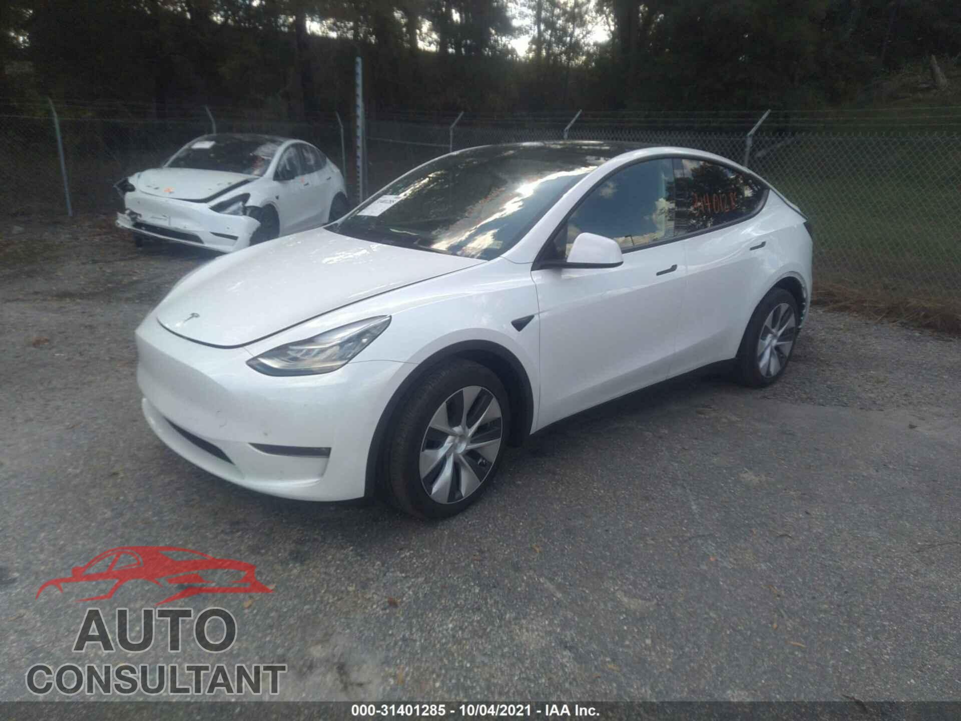TESLA MODEL Y 2021 - 5YJYGDEE5MF204357