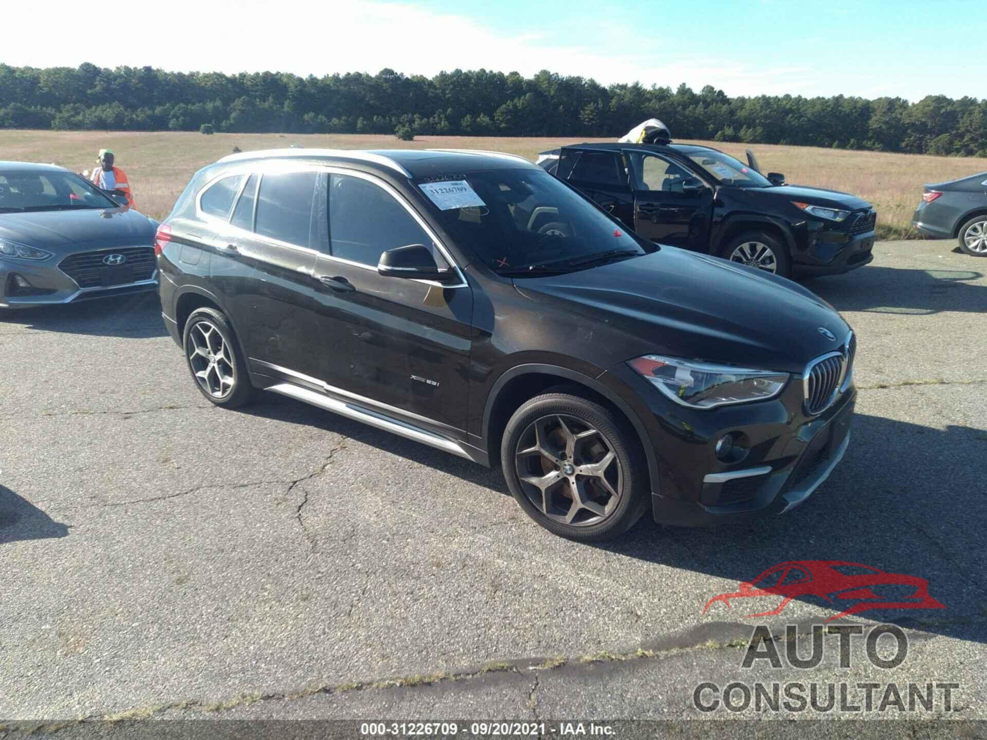 BMW X1 2018 - WBXHT3C37J5F92024